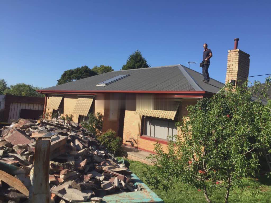 Old tile roof stripped ready for re-roof