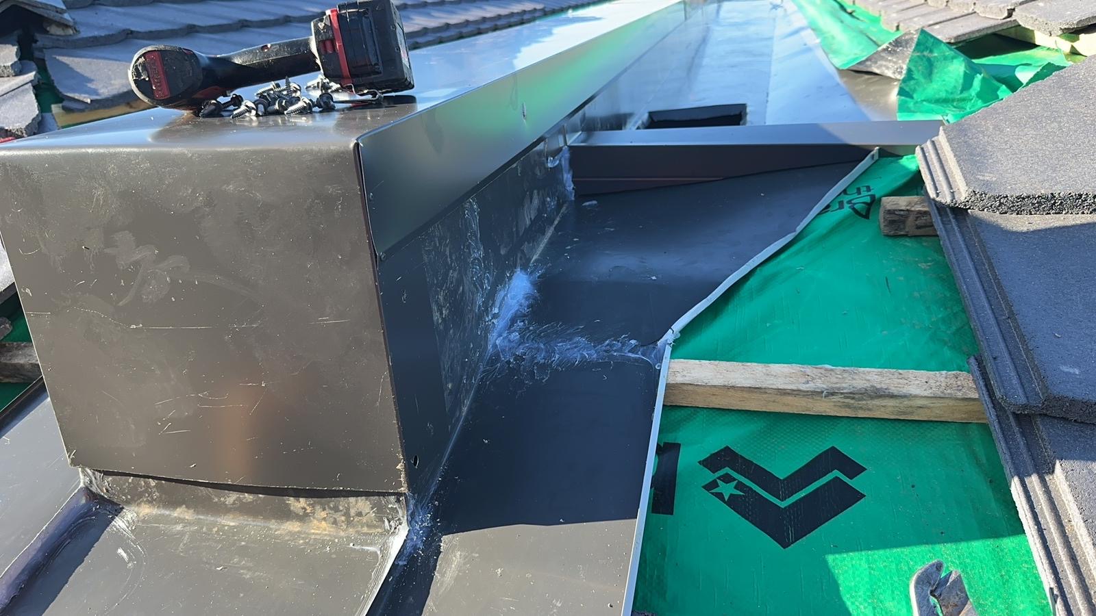 Close-up of new metal box gutter