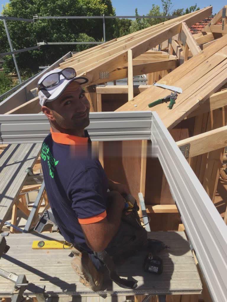 Alex Lin on site during fascia install